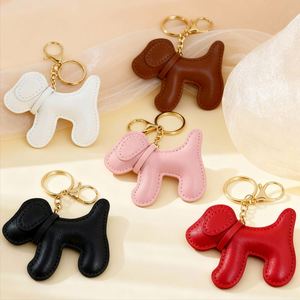พวงกุญแจรูปสุนัขน่ารัก ทำจากหนัง PU  จี้ห้อยกระเป๋า  ของตกแต่งกระเป๋า - Product Image 1