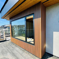Panneau de bardage extérieur en WPC résistant au feu et imperméable à l'eau, texture bois naturel, pour l'architecture moderne