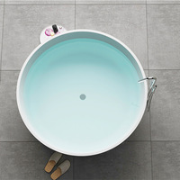 Baignoire ronde noire en résine et marbre, Surface unie en pierre artificielle