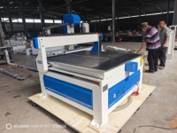 Kit de machine de fraisage CNC 3 axes 4x4 à faible coût avec table à vide à vendre STG1212