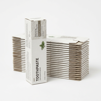 Boîte à dentifrice personnalisée, emballage plat et présentoir assemblé, carton pliable découpé avec précision pour un stockage efficace, vente en gros