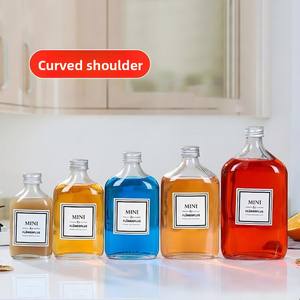 Bouteille en verre cylindrique <span class=keywords><strong>vide</strong></span> transparente de 50 ml à 500 ml pour café froid, jus, eau, <span class=keywords><strong>vin</strong></span>, lait, avec <span class=keywords><strong>bouchon</strong></span> à vis et impression sérigraphique - Product Image 1