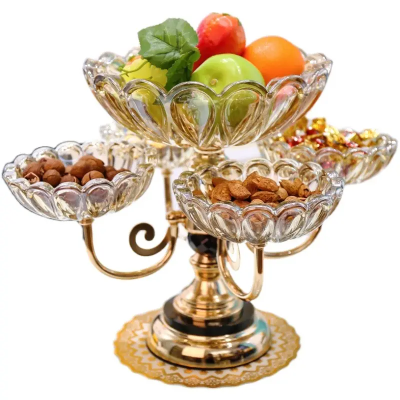Plato de fruta con pies altos para el hogar, cuenco decorativo de cristal giratorio para dulces, Popular, de lujo, para pastel y fiesta, la mejor oferta