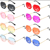 Pas cher 2024 New Halloween citrouille lunettes de soleil irrégulières sans monture danse fête lunettes de soleil tendance