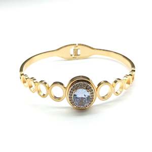 Classic and Trendy Gold Plated Women's Cuff <b>Bracelet</b> Oval Cut <b>Crystal</b> Bezel Setting for Gift Made of Zinc Alloy - Product Image 1
