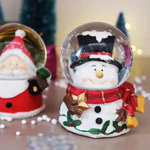 2023 Alta qualidade Natal decoração Resina Personalizado Musical Water Globe Resina Neve cerâmica Natal ornamentos Globo De Vidro