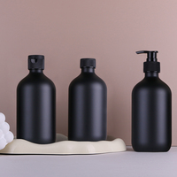 Bouteille vide de shampooing et d'après-shampooing PET écologique de luxe en gros de 500ML pompe cylindrique Lotion hydrosol noire bouteille vide