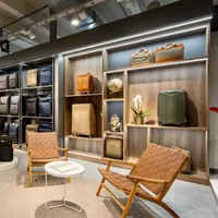 Meubles de magasinage pour bagages personnalisés, unité d'affichage de sacs murale sur mesure, vitrine