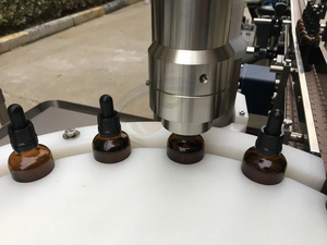 เครื่องบรรจุน้ำมันหอมระเหยและเซรั่มบำรุงผิวแบบอัตโนมัติ พร้อมฝาปิดแบบโมโนบล็อก สำหรับขวดพลาสติก/กระดาษ รับประกัน 1 ปี - Product Image 4