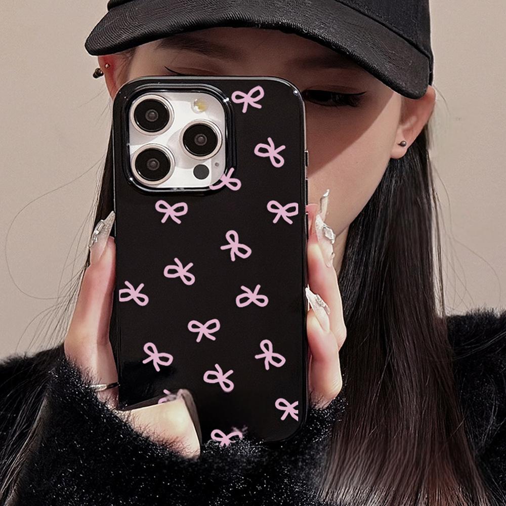 Glossy black with small rose pink bows