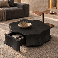 Table basse en bois noir festonné avec tiroir frontal incurvé et corps ondulé massif pour des aménagements de salon modernes et spacieux