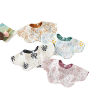 Vente en gros 100% bavoirs jetables en crêpe de coton biologique pour bébé bandana mignon design uni imprimé douceur bouton pression pour les nourrissons