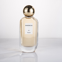 Flacon de parfum de luxe, nouveau design, 50ml 100ml, en verre transparent rectangulaire à base lourde, avec pulvérisateur et capuchon rond