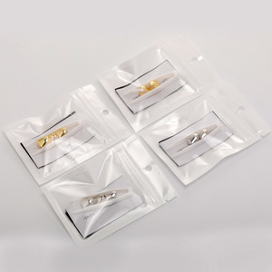 Set di denti dorati Jin Aos, bestseller, placcati in vero oro, decorazione personalizzata per apparecchi ortodontici in stile hip-hop europeo e americano. - Product Image 2