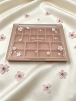 Palette de maquillage vide à 10 grilles avec couvercle transparent et base rose pour fard à paupières personnalisé et cosmétique