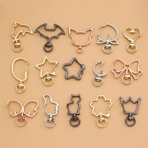 3 Colors Creative Keychain Five-pointed Star Moon Dolphin Cherry Blossom cat Heart-shaped Alloy DIY Keychain Accessory - Product Image 1