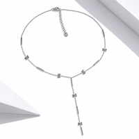 Collier Lariat en Acier Inoxydable avec Breloques Fleur, Plaqué Rhodium, Design Minimaliste pour un Port Quotidien