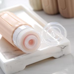 Ensemble de bouteilles de voyage pour shampoing en silicone cosmétique Squeeze de 100ml, kit de bouteilles de voyage en silicone pour conteneur de toilette rechargeable - Product Image 2