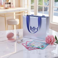 Sac en papier argenté de luxe avec poignée en ruban, durable, réutilisable, imperméable, personnalisable pour cadeaux de beauté, cosmétiques, parfums, soins de la peau