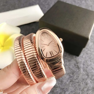 Nouvelle <span class=keywords><strong>Montre</strong></span> à Quartz <span class=keywords><strong>Femme</strong></span> 2025, Design de Niche Tendance, <span class=keywords><strong>Bracelet</strong></span> en Acier Allié Tête de Serpent Trois Cercles, Haute Valeur, Vente en Gros - Product Image 2