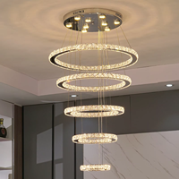 Lustre de salon en cristal multi-anneaux personnalisé, lumière circulaire moderne, luxe créatif, lampe suspendue en cristal pour hall duplex