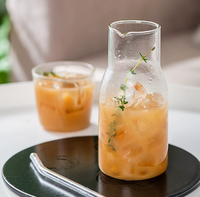 Pichet à eau froide individuel en verre borosilicate de haute qualité, avec une tasse intégrée, pour boissons fraîches estivales
