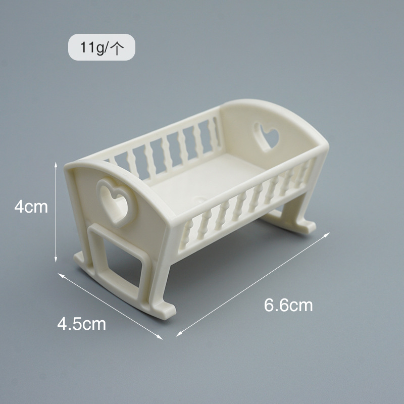 White mini baby crib