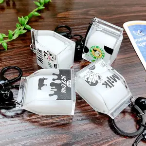 High quality custom design liquid oil milk cartoon acrylic keychain with black metal key ring bag phone accessory decoration