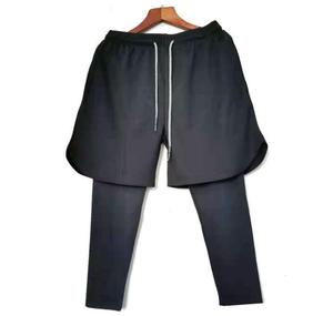 Vente en gros de pantalons de sport décontractés de fitness à séchage rapide pour hommes, shorts amples, pantacourt d'été, taille élastique, grande taille en toile - Product Image 1