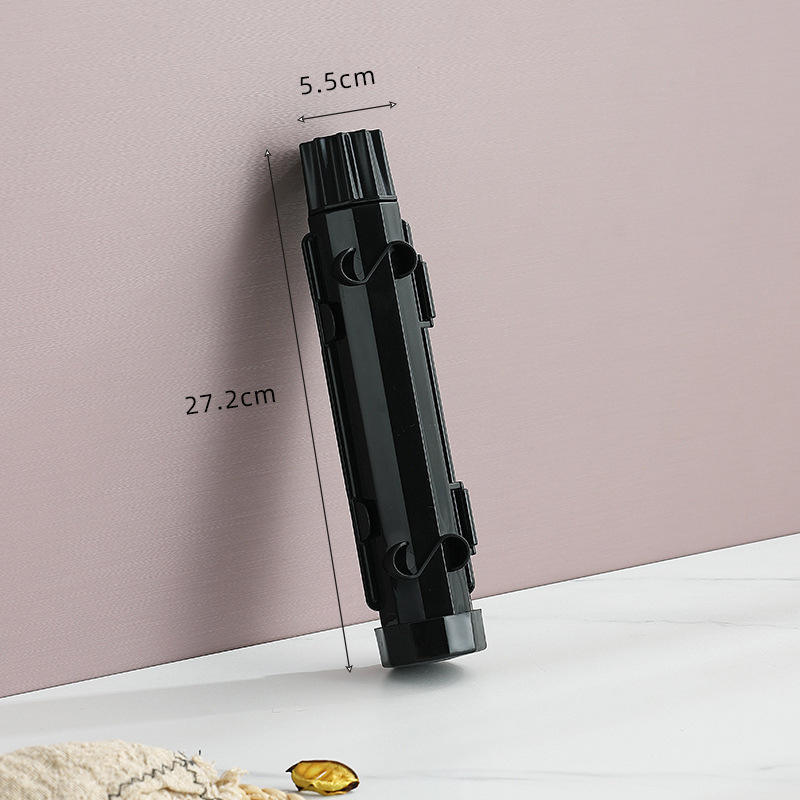 Bolso opp tubo negro a rayas