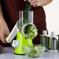 En stock Râpe à fromage rotative 3 en 1 Boîte à tambour rotative multifonctionnelle Coupe-fruits et légumes avec poignée