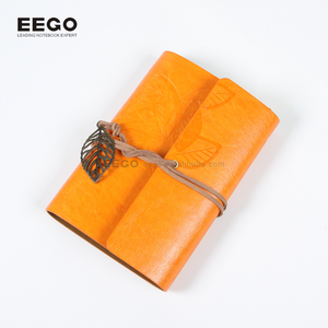 Tùy Chỉnh A6 Cổ Điển Handmade Treo Kim Loại Biểu Tượng PU Da Du Khách Nhẫn Chất Kết Dính Tạp Chí Máy Tính Xách Tay Với Dây Đeo - Product Image 4