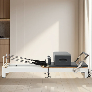 Reformer Pilates à basse hauteur en aluminium blanc, stable et sûr pour la rééducation et le fitness, idéal pour les studios et salles de yoga - Product Image 1