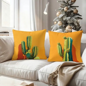 Bantal hias bertema kaktus menambahkan nuansa gurun pasir pada dekorasi ruang tamu liburan yang nyaman dengan stocking pesta dan tanduk rusa. - Product Image 4