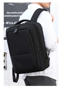 กระเป๋าเป้สะพายหลังโน้ตบุ๊ค XINGYONZHE FD-067 รุ่นทันสมัย ทำจากโพลีเอสเตอร์ พร้อมพอร์ตชาร์จ USB หูหิ้วปิดแบบรัด น้ำหนักเบา เหมาะสำหรับใช้ในโรงเรียน สีดำ - Product Image 3