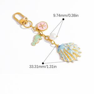 Nouvelle mode <span class=keywords><strong>sac</strong></span> accessoires18 k plaqué or en acier inoxydable étoile de mer coquille breloque porte-clés étanche émail métal porte-clés - Product Image 6