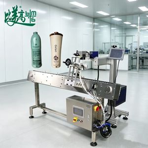Machine de marquage laser pour gravure sur bouteilles en verre, avec positionnement rotatif de cylindres en acier inoxydable, inspection automatique et étiqueteuse numérique pour la production. - Product Image 1