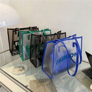 Bolsa de Compras de PVC Transparente Impermeable con Asa de PU, de Gran Capacidad, para Viaje o Playa, con Logotipo Personalizado, MOQ Bajo - Product Image 1