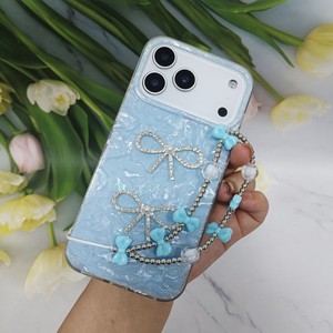 Funda Protectora para Teléfono con Diseño de Concha 3D, Lazo de Diamantes y Correa de Muñeca con Cuentas, para iPhone 17 Pro Max 16 15 14 11 Samsung - Product Image 5