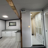 Maison conteneur à structure en acier robuste, cabine modulaire pliable durable, bureau mobile résistant aux intempéries pour la construction en extérieur