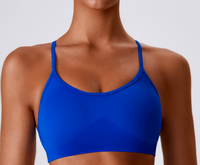 Ensemble de sport sans couture pour femme grande taille : Soutien-gorge rembourré à logo et bretelles croisées, dos ouvert, et short uni