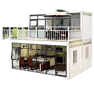 易于组装的别墅，带前侧玻璃墙和露台，低成本公司建造舒适的预制模块化房屋