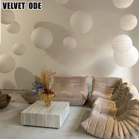Ligne - Fauteuil Roset en velours technique lavable Caterpillar togo - Canapé de sol - Fauteuil ergonomique nordique pour le salon
