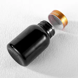 स्टॉक में खाली प्लास्टिक की गोली बोतल काले खाद्य ग्रेड जार पेंच के साथ सोने की टोपी के लिए विटामिन पूरक गोली कैप्सूल गोली की बोतलें