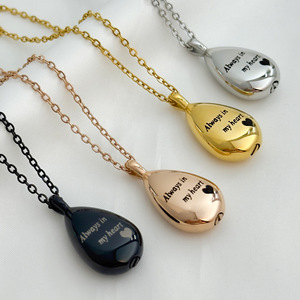 สร้อยคอทรงหยดน้ำสแตนเลสสุดฮิต พร้อมจี้ขวดน้ำหอมแบบเปิดได้ สลักลายไม้ไผ่ DIY สำหรับเก็บของที่ระลึกคนรักหรือสัตว์เลี้ยง - Product Image 1