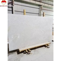 Dalle de marbre blanc rétroéclairé en onyx de l'âge glacial translucide de haute qualité, pierre naturelle pour panneau mural, plateau de table, comptoir, hôtels