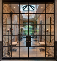 Porte en acier et verre avec grille décorative en fer forgé de haute qualité