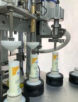 Machine automatique de remplissage et de scellage de tubes à air chaud pour crèmes vitaminées, crèmes à base de plantes, gels solaires et lotions
