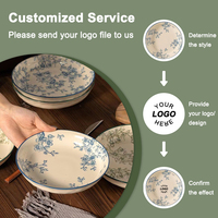 Service de vaisselle en porcelaine de luxe avec logo personnalisé, assiette en céramique bleue, plante florale, service de restaurant, chargeur à bas prix