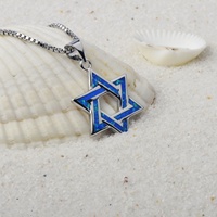 Vente en gros juive Exploitations de vent Opale bleue Collier étoile à six branches Plaqué or Style religieux Chaîne à maillons Opale incrustée
